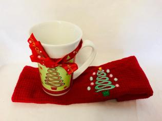 Ceramic Mug with Christmas Decoration and Red Dishcloth