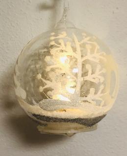 Sfera in vetro luminosa da appendere.