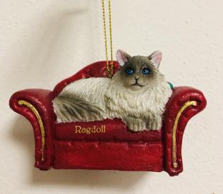 PENDAGLIO GATTINO SUL SOFA'
