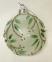 Glass sphere decorated with leaves