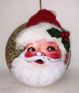 Snowball sphere with face of Santa Claus